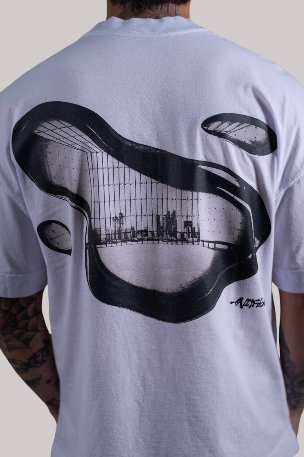 CAMISETA ALLTRIBE OVERSIZED PRISONER- NEW MONEY